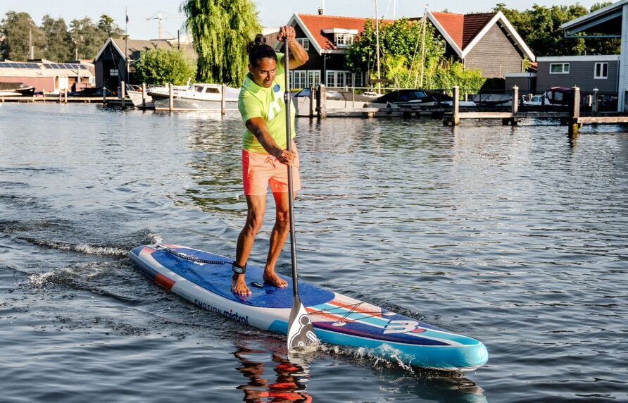 Mistral EMOTION 14'0 INFLATABLE - SUP / CRUISING / ENTRY RACE – COMPLETE SET Inflatable SUP board Blue orange in action