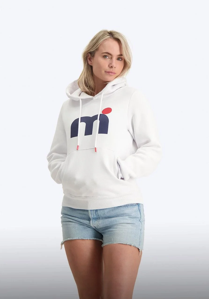A woman wearing a Mistral hoodie